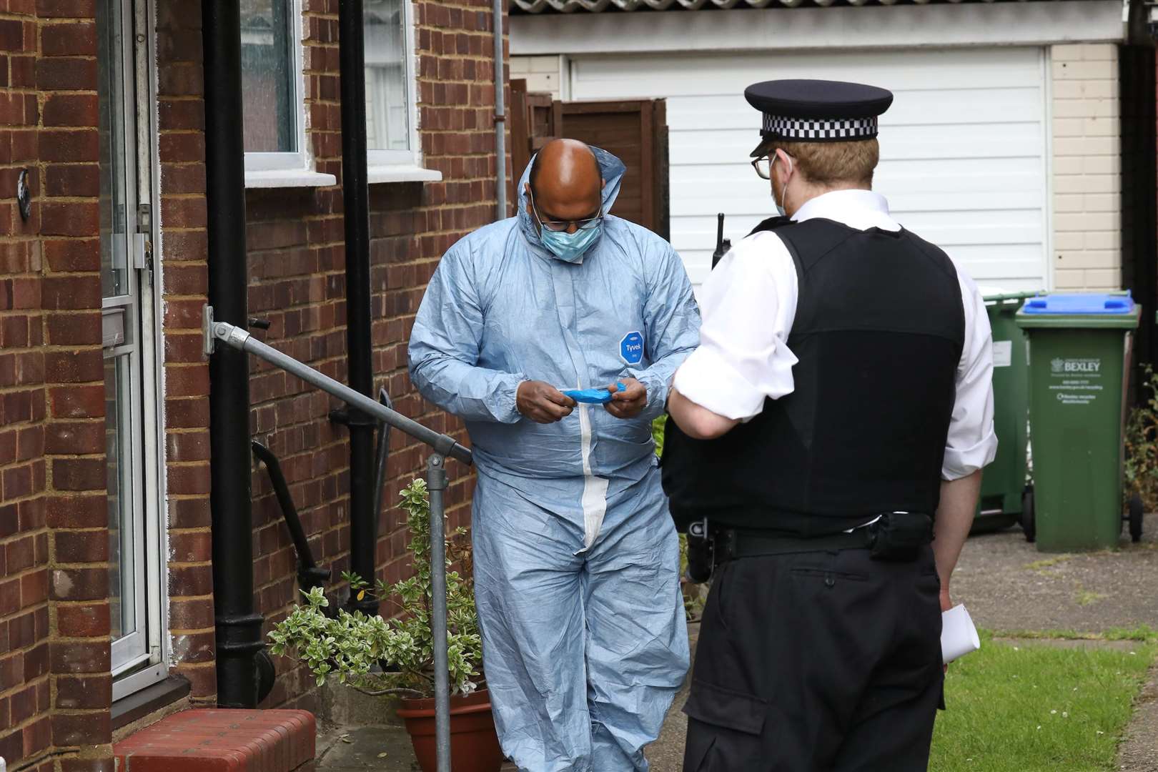 Forensics officers at the scene. Picture:UKNiP