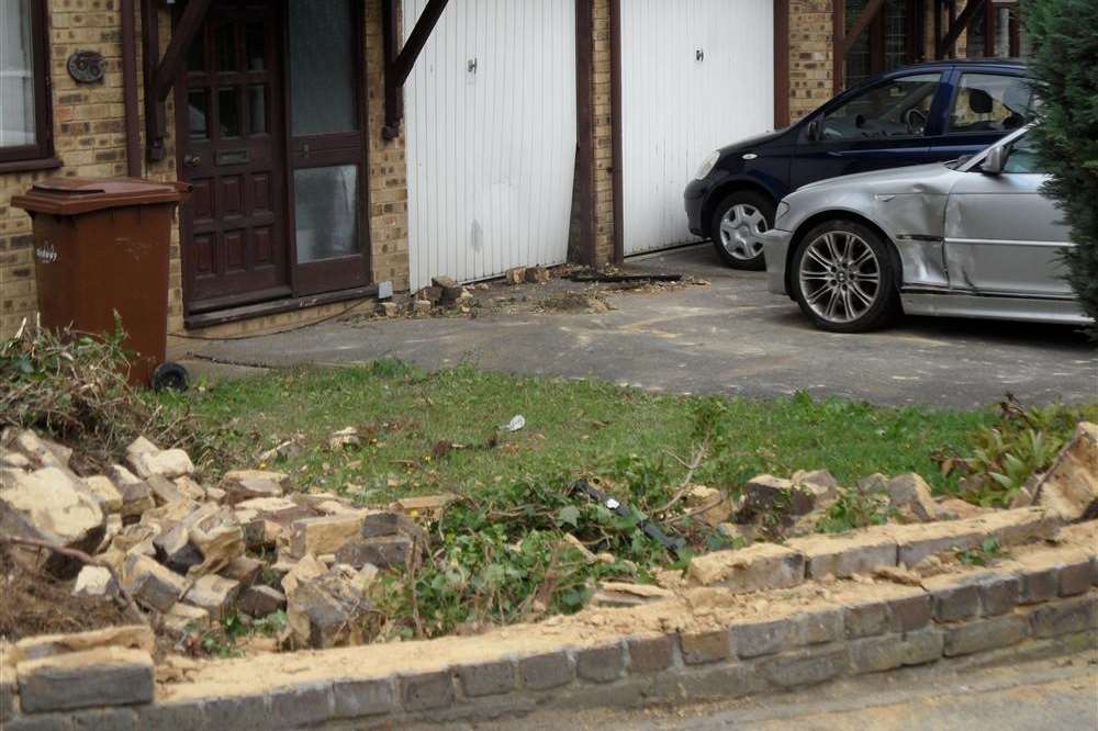 Damage to a house in Mierscourt Road, Rainham, after the crash