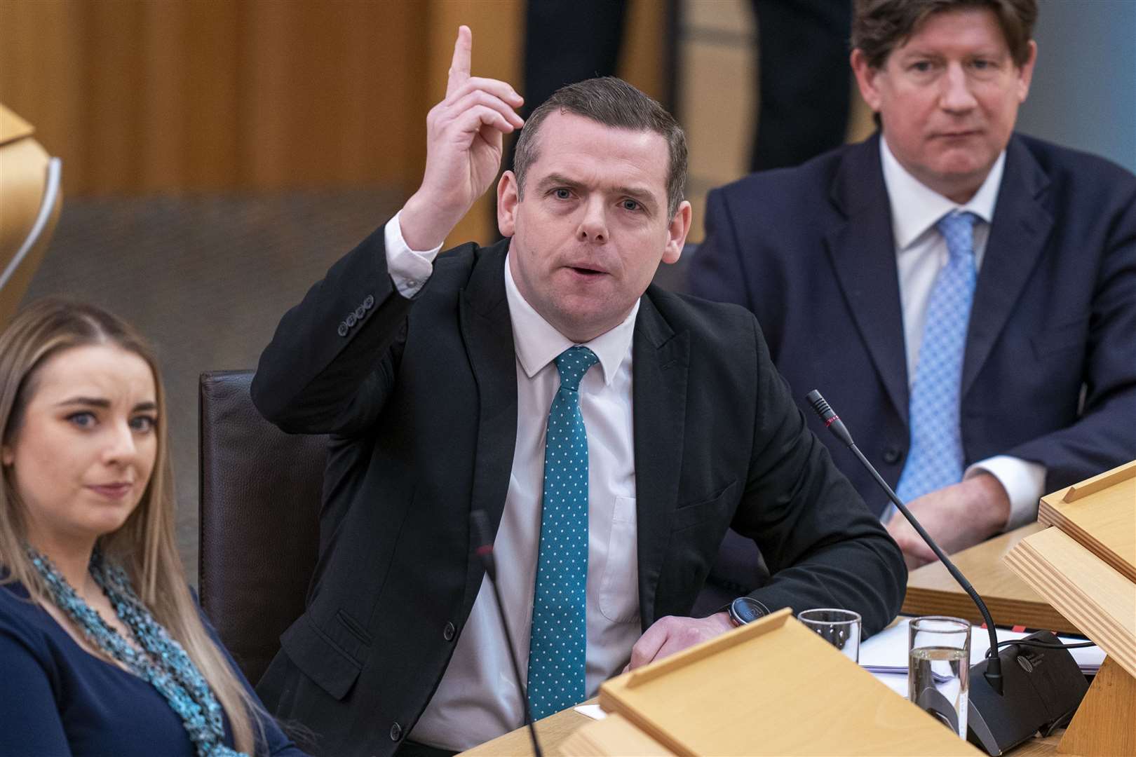 The First Minister was questioned on the Act by Scottish Tory leader Douglas Ross (Jane Barlow/PA)