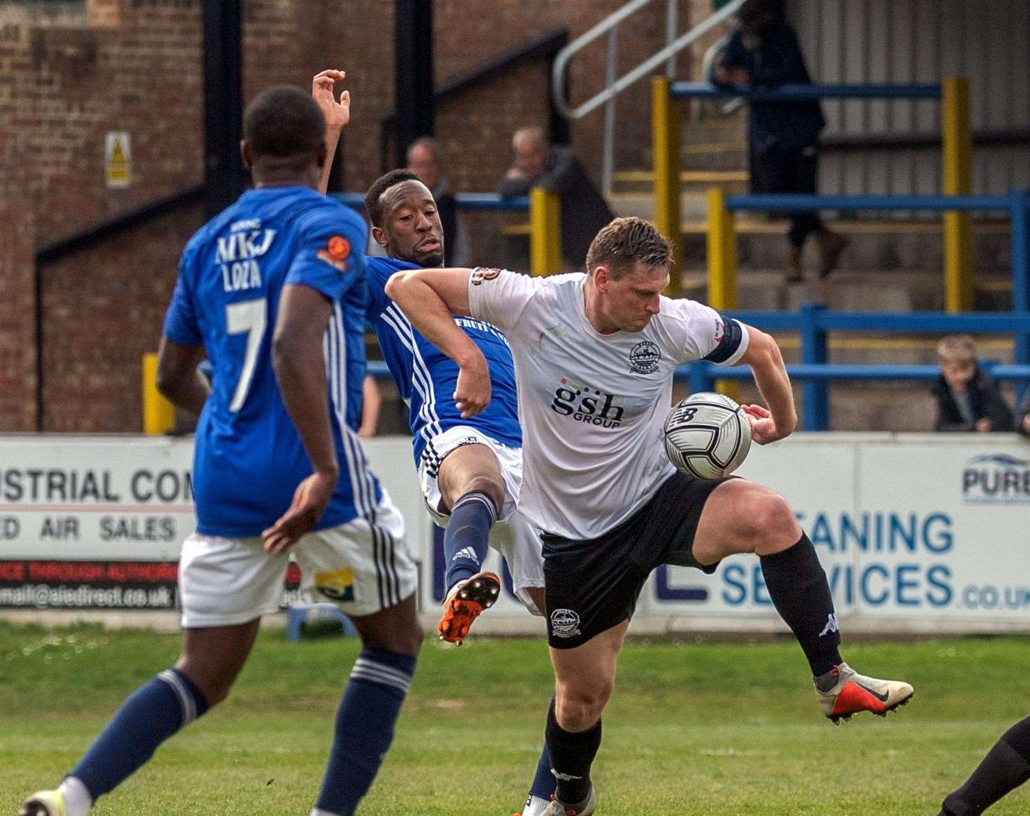Dover skipper Jake Goodman tries to control the ball. Picture: Stuart Brock