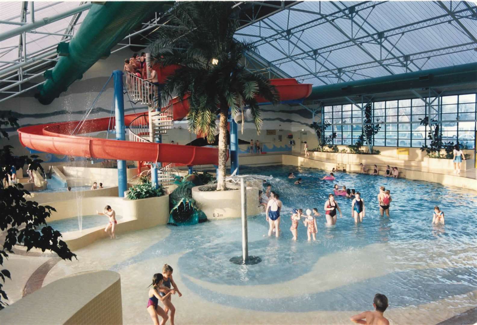 The pool, pictured here in the 90s, has flumes and a wave machine
