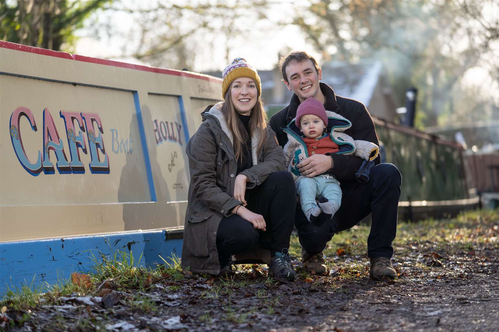 Joanna and Victor Gould, both 34, and son William Gould, 15 months, who moved from London to start a canal boat cafe. Picture: SWNS