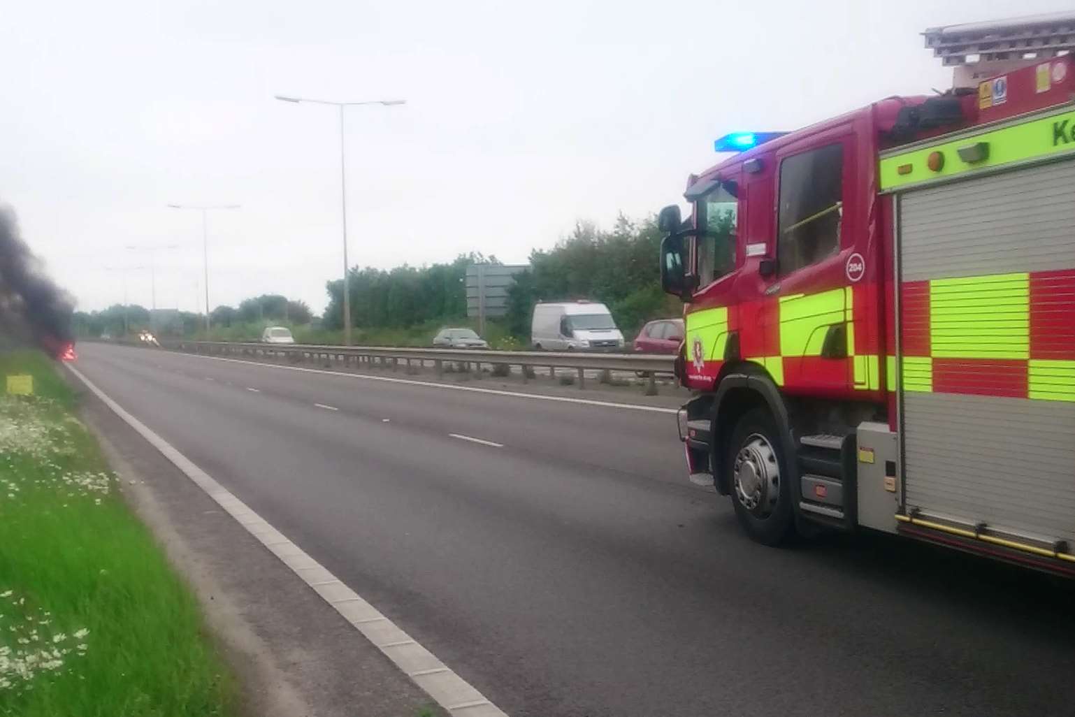 Fire engines rush to tackle the car fire on Thanet Way