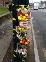 Floral tributes to Darren Saunders, who died on Tonbridge Road on Saturday