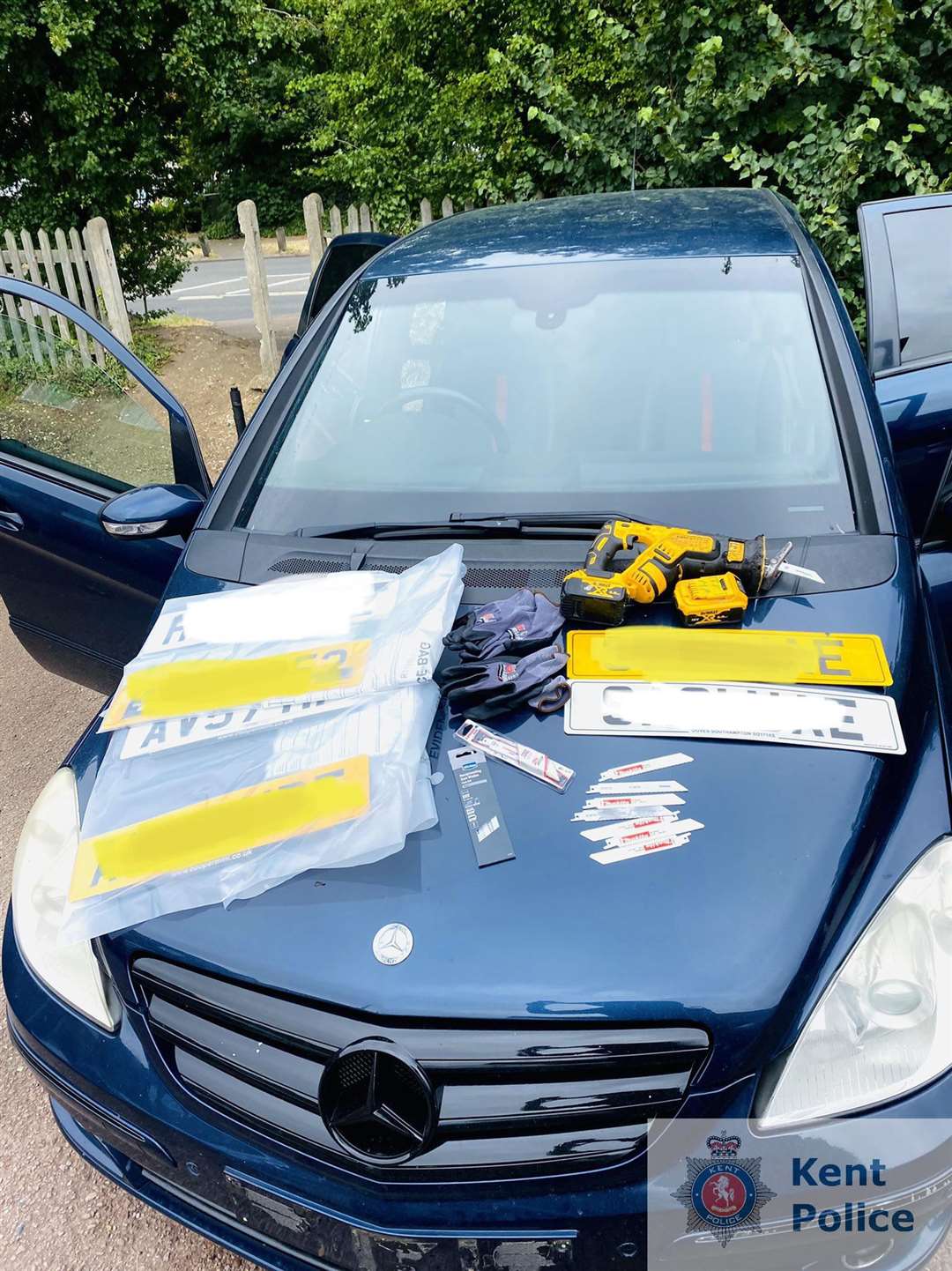 Officers found stolen number plates and tools potentially useful to steal catalytic converters inside the car. Picture: Kent Police