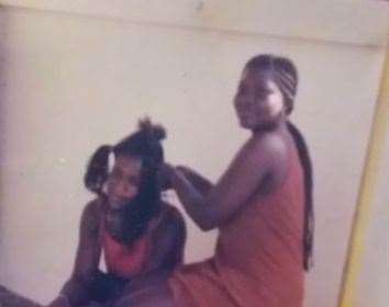 Belinda had her hair braided by one of the other hairdressers while training in Ghana