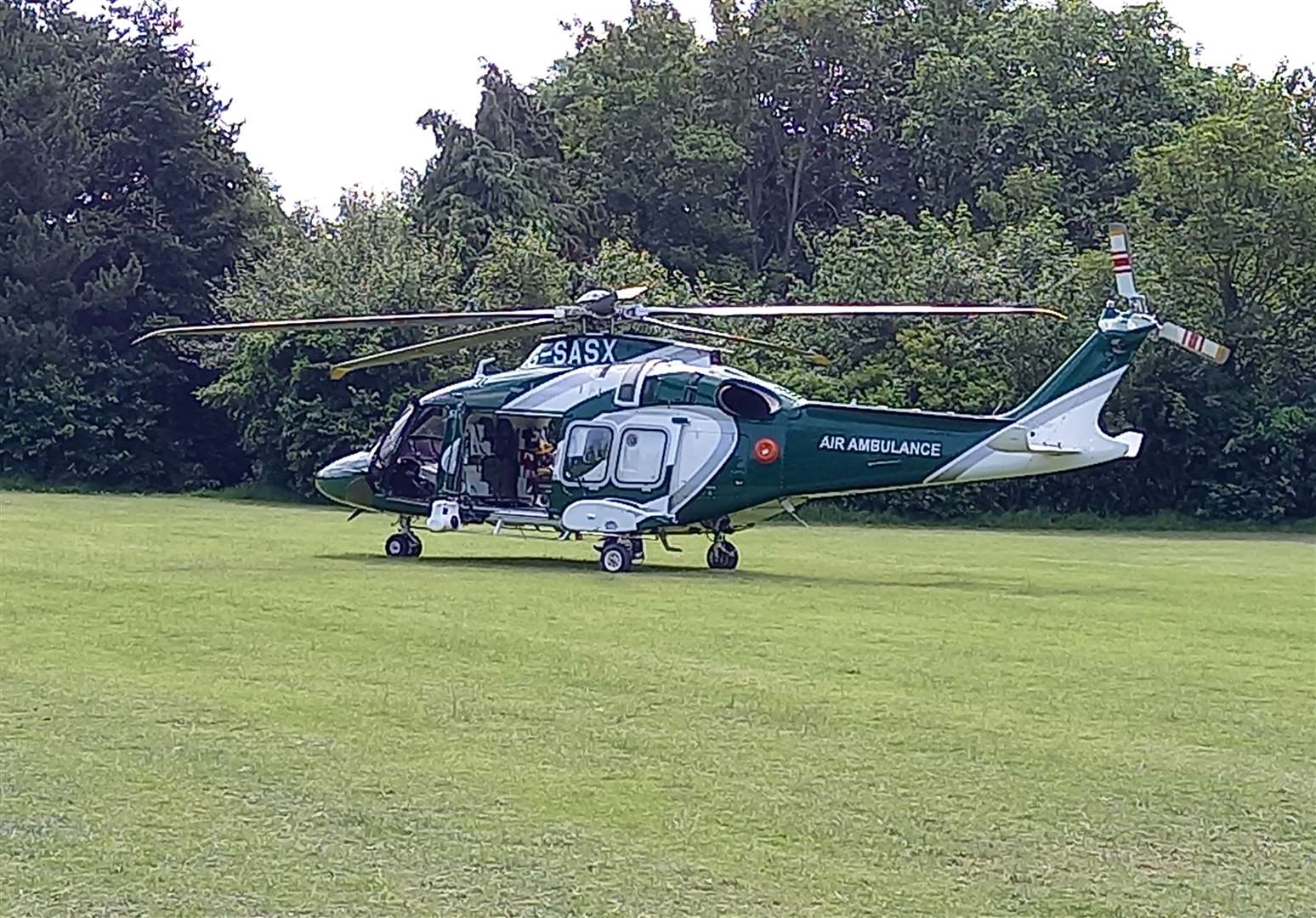 An air ambulance has landed in Cherry Orchard Playing Field, Herne