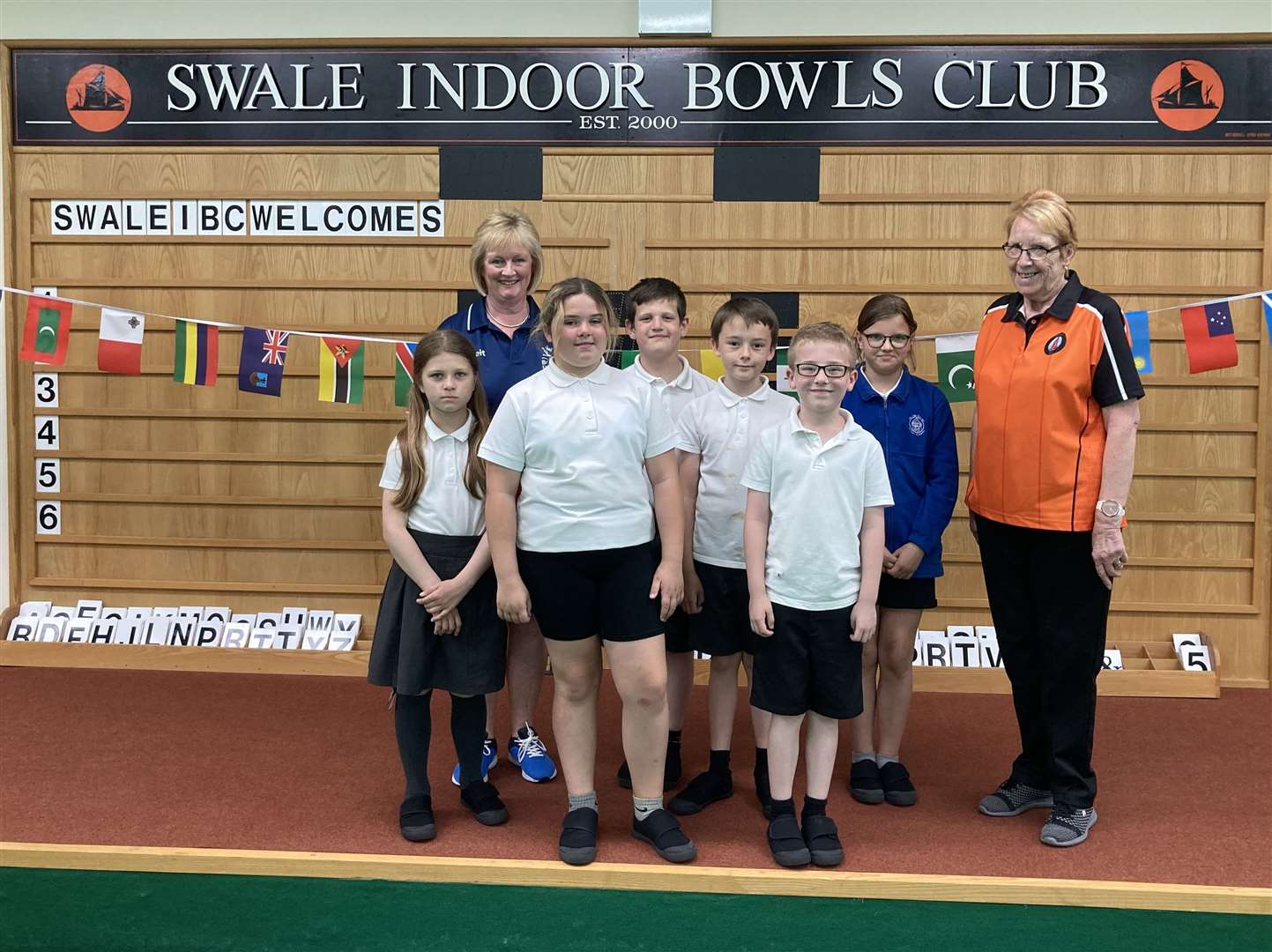Swale Indoor Bowling Club played host to school children from Milton Court Primary Academy, some of those are pictured with with Sandy Hazell and club director Jean Hackers