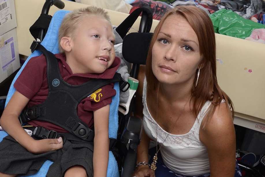 Sam Kay with her disabled son Jake