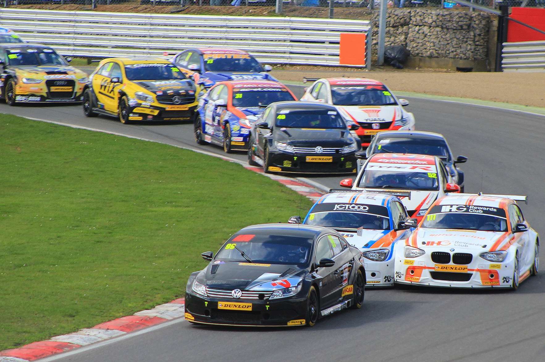 Jason Plato leads the field at the start of race two before suffering a puncture. Picture: Joe Wright