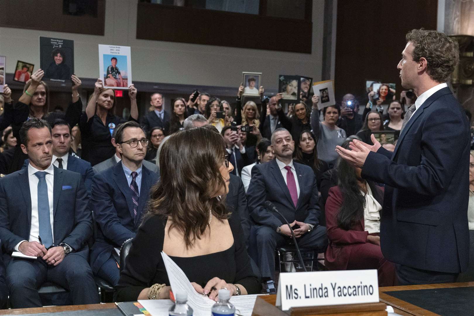 Meta chief executive Mark Zuckerberg turns to address parents during the Senate Judiciary Committee (Jose Luis Magana/AP)