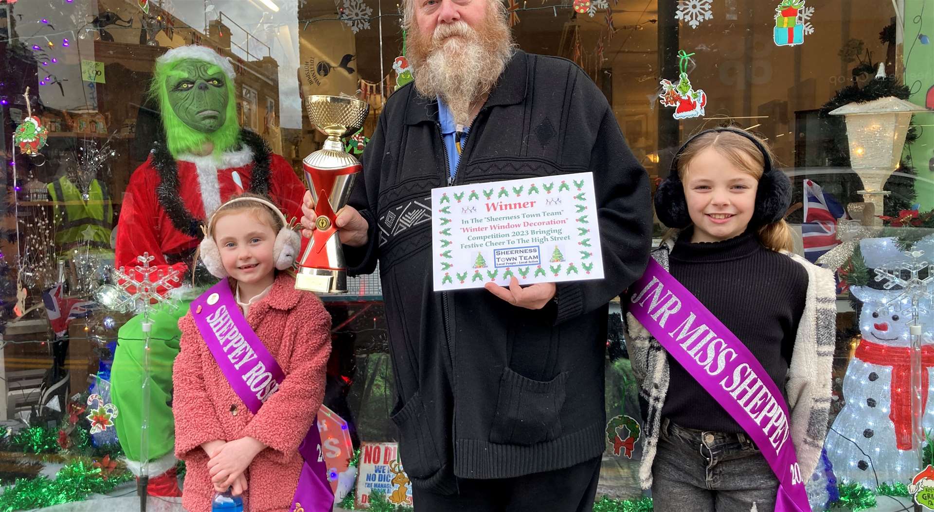 Winter window winner Kevin Freshwater of House To Home with Sheppey Rosebud Delilah-Beau Collins, 7, and Junior Miss Sheppey Lola Dalton, 9 Photo: John Nurden