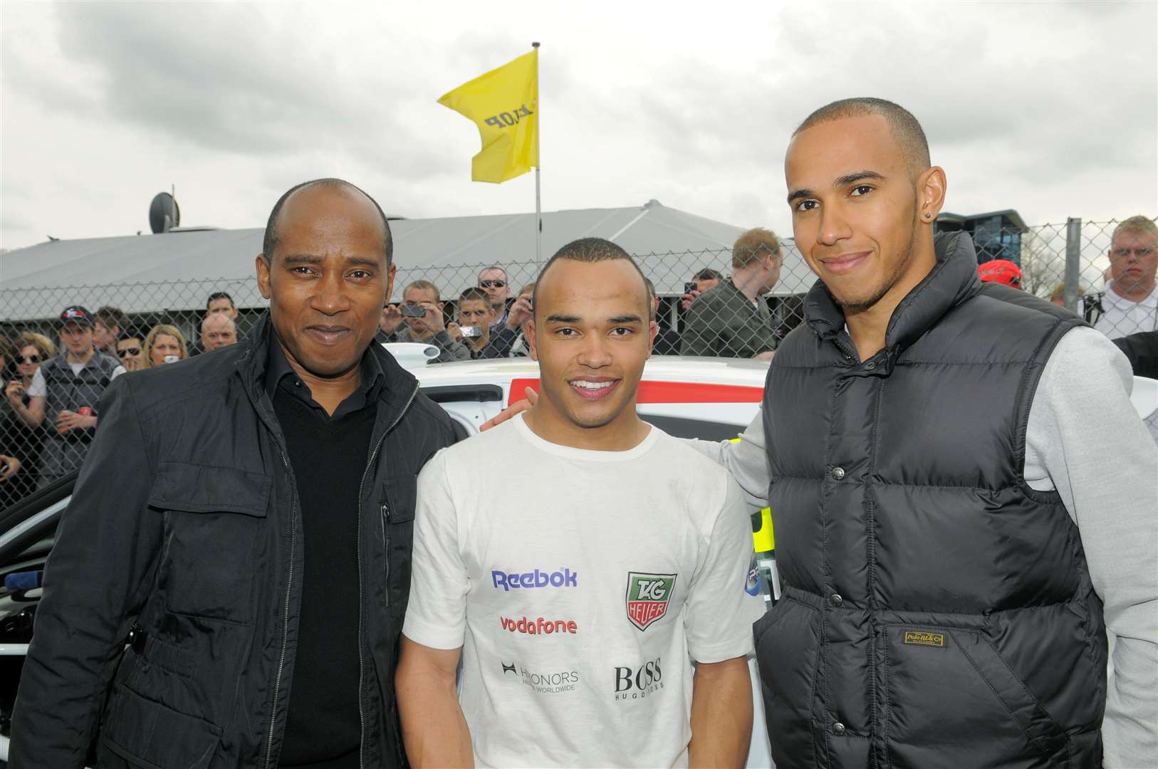 Lewis with his dad Anthony supporting his brother Nic in Kent in 2011
