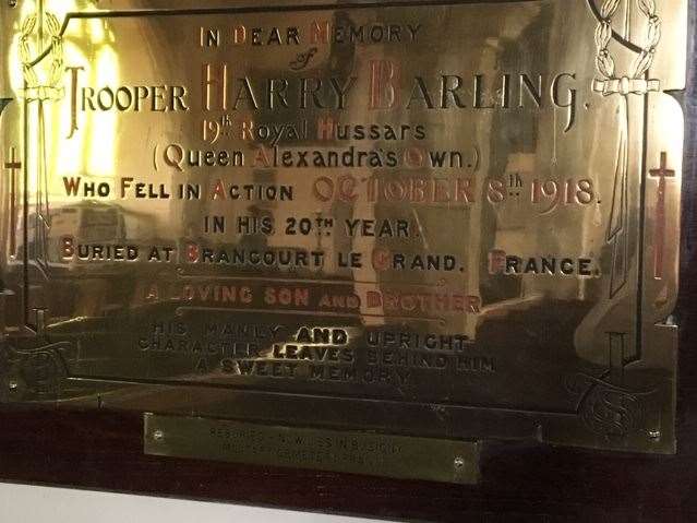The brass plaque to Trooper Harry Barling inside All Saints Church, which was erected by his brother