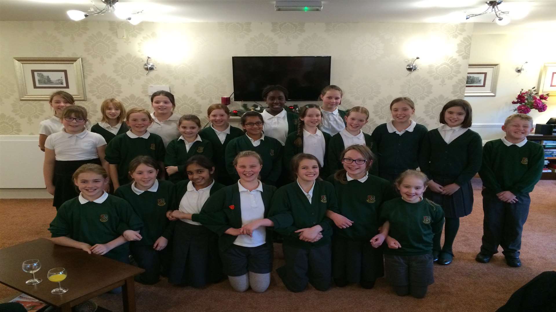 Christmas carols at Waterside Lodge with pupils from Slade Primary School