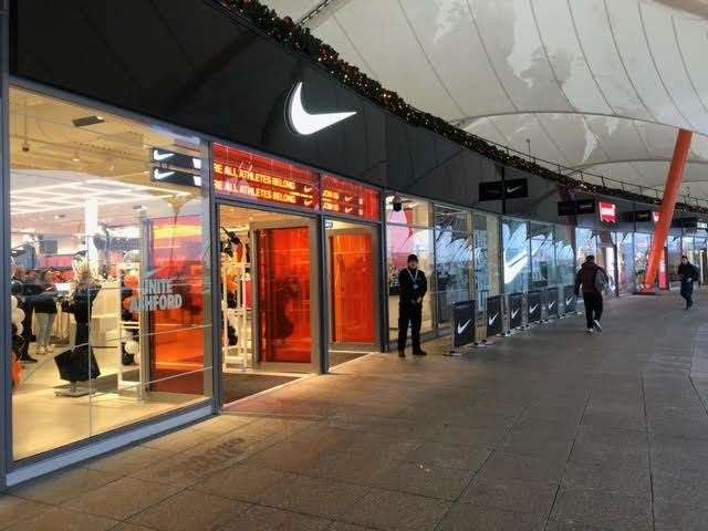A woman ended up in court after being caught stealing a pair of trainers from Nike at Ashford Designer Outlet