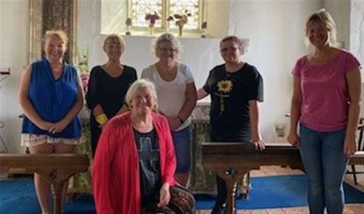 Church warden Sue Hopper (second left) and Rev Cindy Kent, front, were part of the clean-up operation at the Leysdown church in 2020. Picture: Joseph Fowler