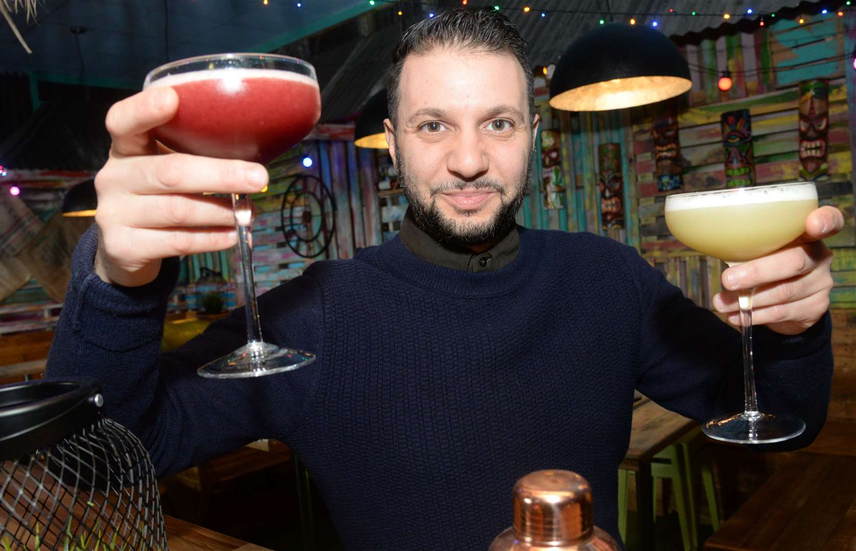 Owner Hassan Hassan with the CBD-infused cocktails