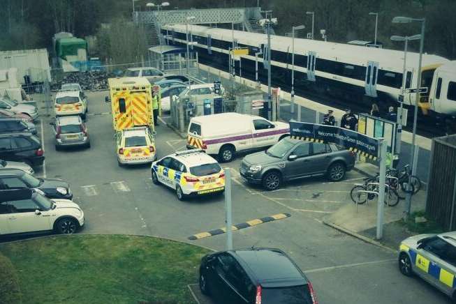 Police at Dunton Green after a man was hit and killed by a train. Picture: @hotpotayto