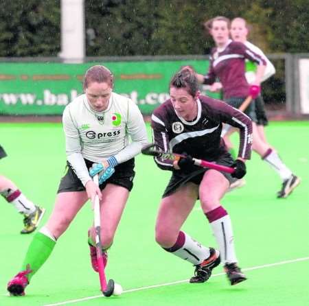 Lucy Barnes comes away with the ball against Olton