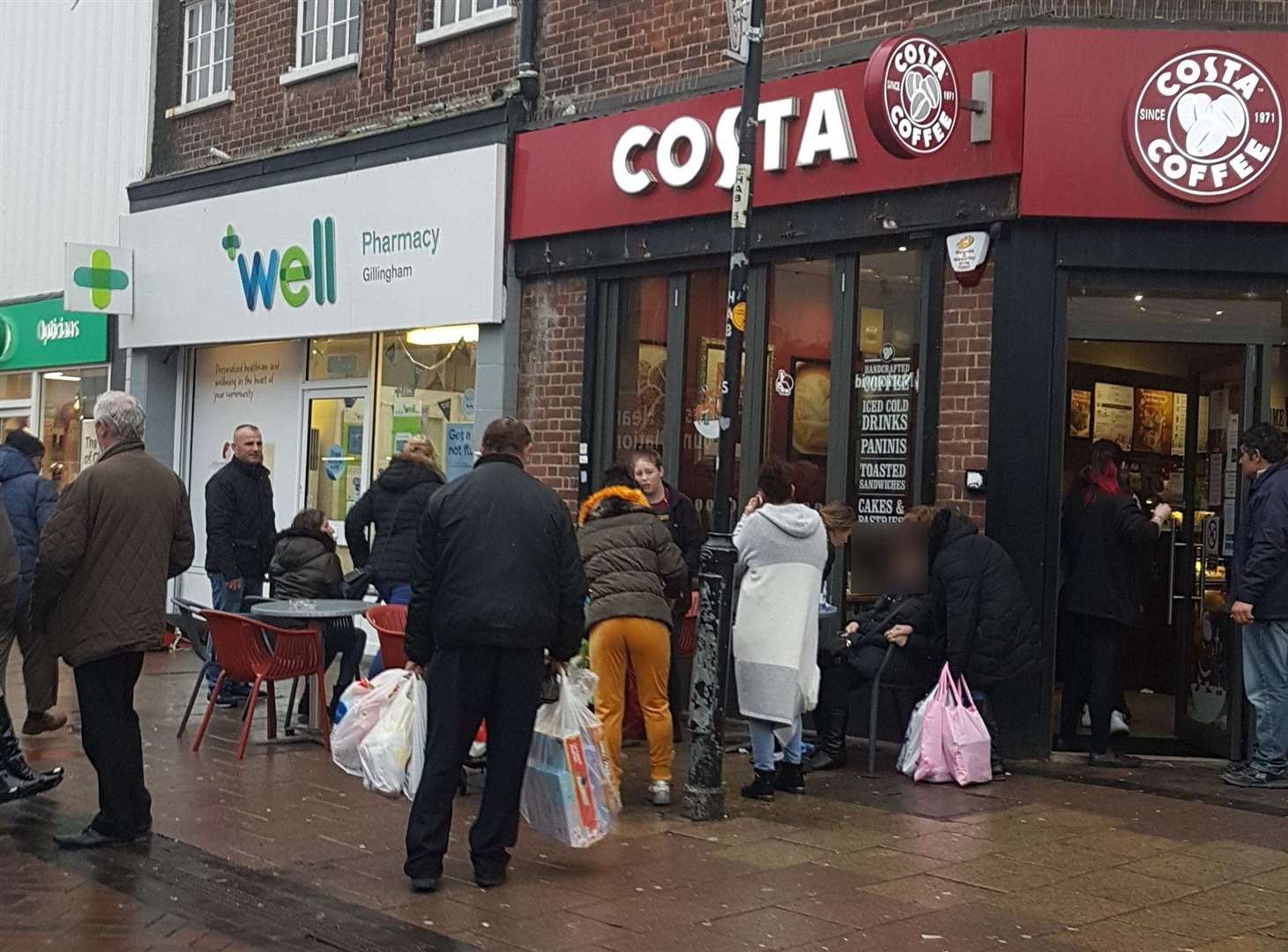 The crowd of people outside Costa Coffee in Gillingham High Street. Picture: Bobby Lockwood