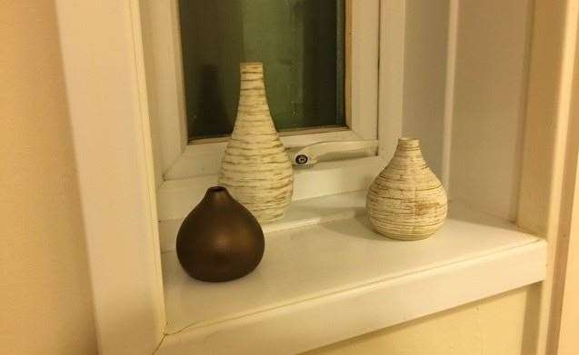 Unusual touches you might not see inside the gents in other pubs – a collection of three vases/pots on the windowsill