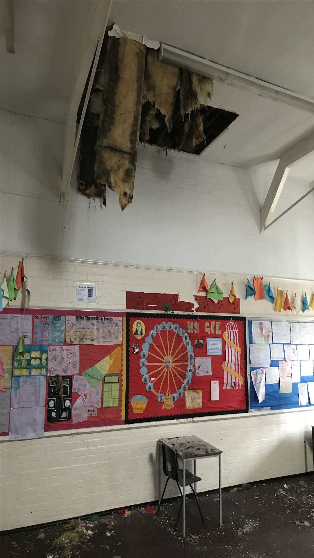 The burst pipe damaged the ceiling in three of the maths classes.