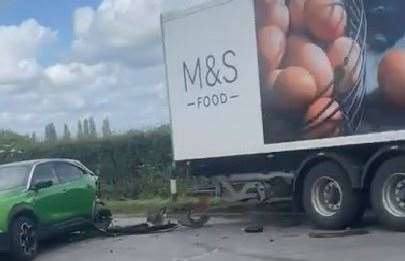 Three vehicles including an M&S delivery lorry were involved in the crash on the A28 Ashford Road at Chilmington Green. Picture: Dom Hatley