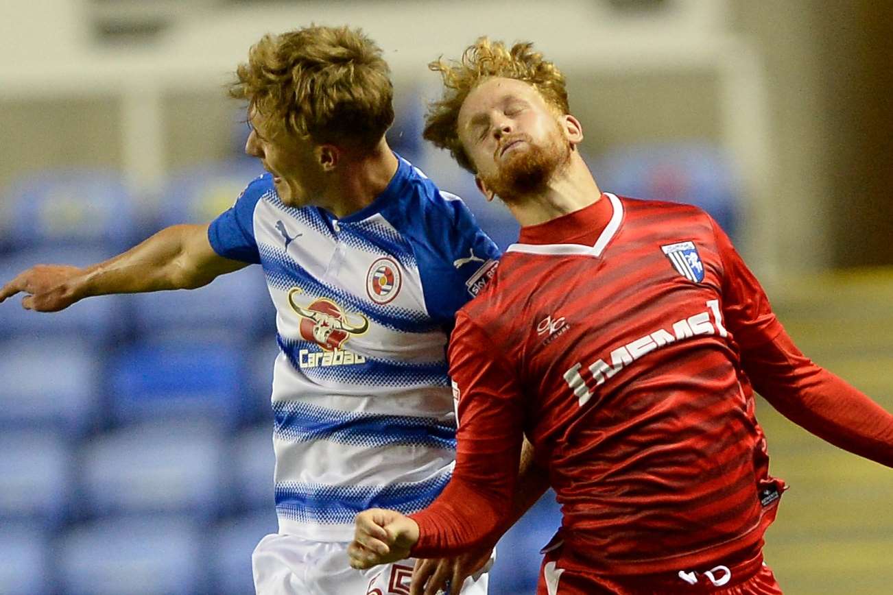 Connor Ogilvie and Reading's Sam Smith leap into action Picture: Ady Kerry