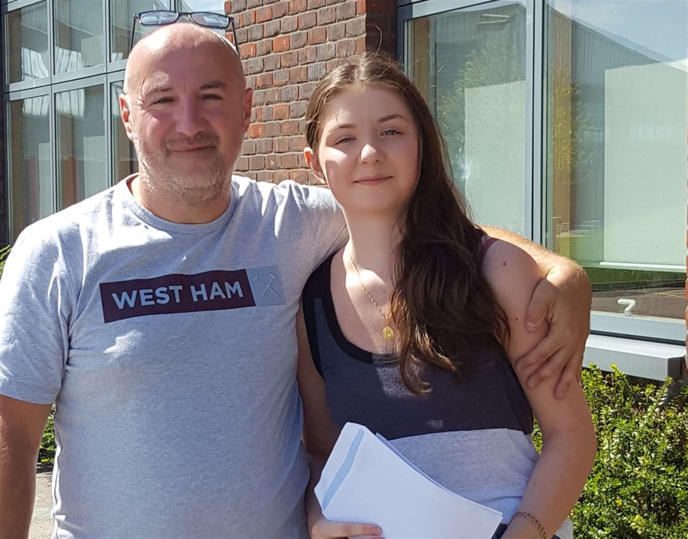 Grace Scopp, of Sheppey's Oasis Academy, with dad Ashley