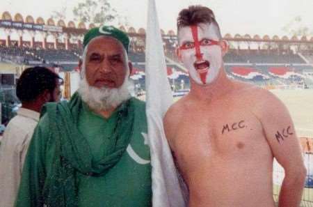 Kent member Toby Brealy, right, with a Pakistan supporter at the Lahore cricket ground in 2000