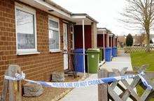 Police have taped off a row of bungalows in Bramley Road, Eastchurch