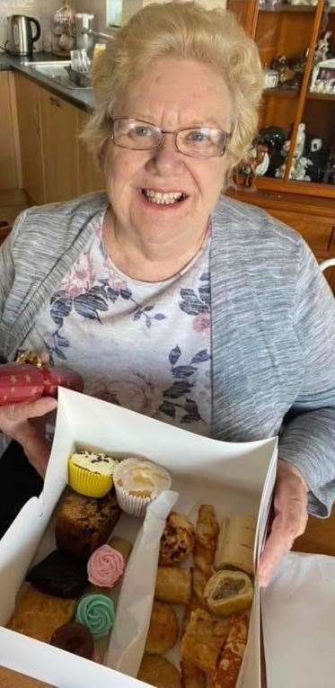 Sylvia Davies enjoys receiving her Coxheath afternoon tea
