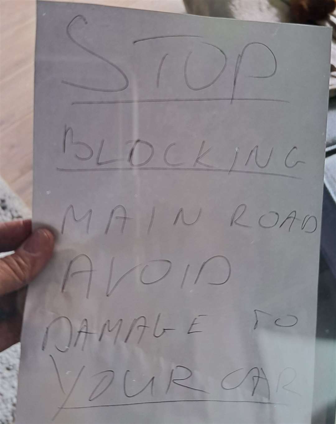 Flyers threatening damage to cars were left on windscreens along Harvesters Way, Weavering. Picture: Mark Wright