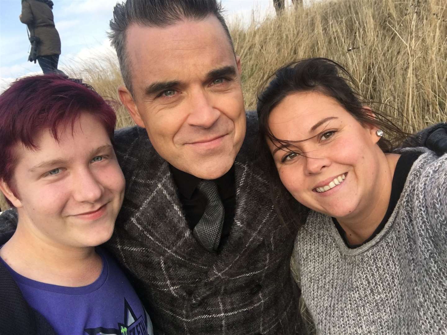 Robbie Williams posing with Dan Hughes and Sasha Burgoine in Leysdown the last time he filmed in Kent