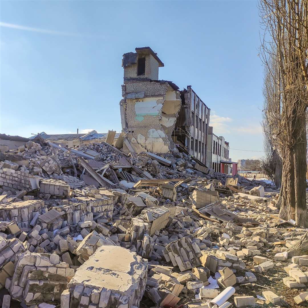 Kharkiv, UKRAINE - March 16, 2022: War of Russia against Ukraine. Damaged by enemy missiles of Kharkov school.