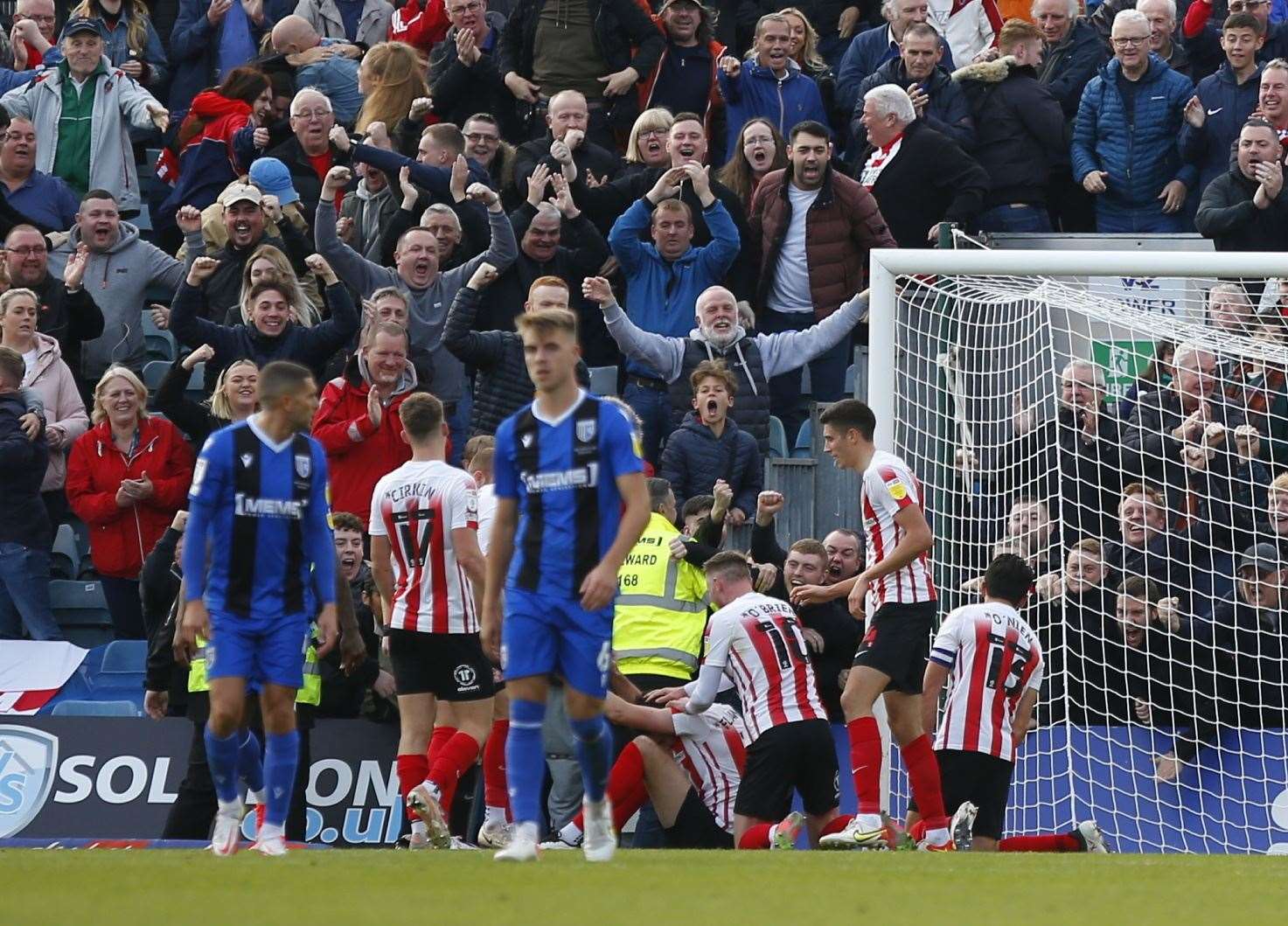 Gills are left despondent as Sunderland and their fans celebrate the winner, scored by former Gillingham defender Tom Flanagan Picture: Andy Jones