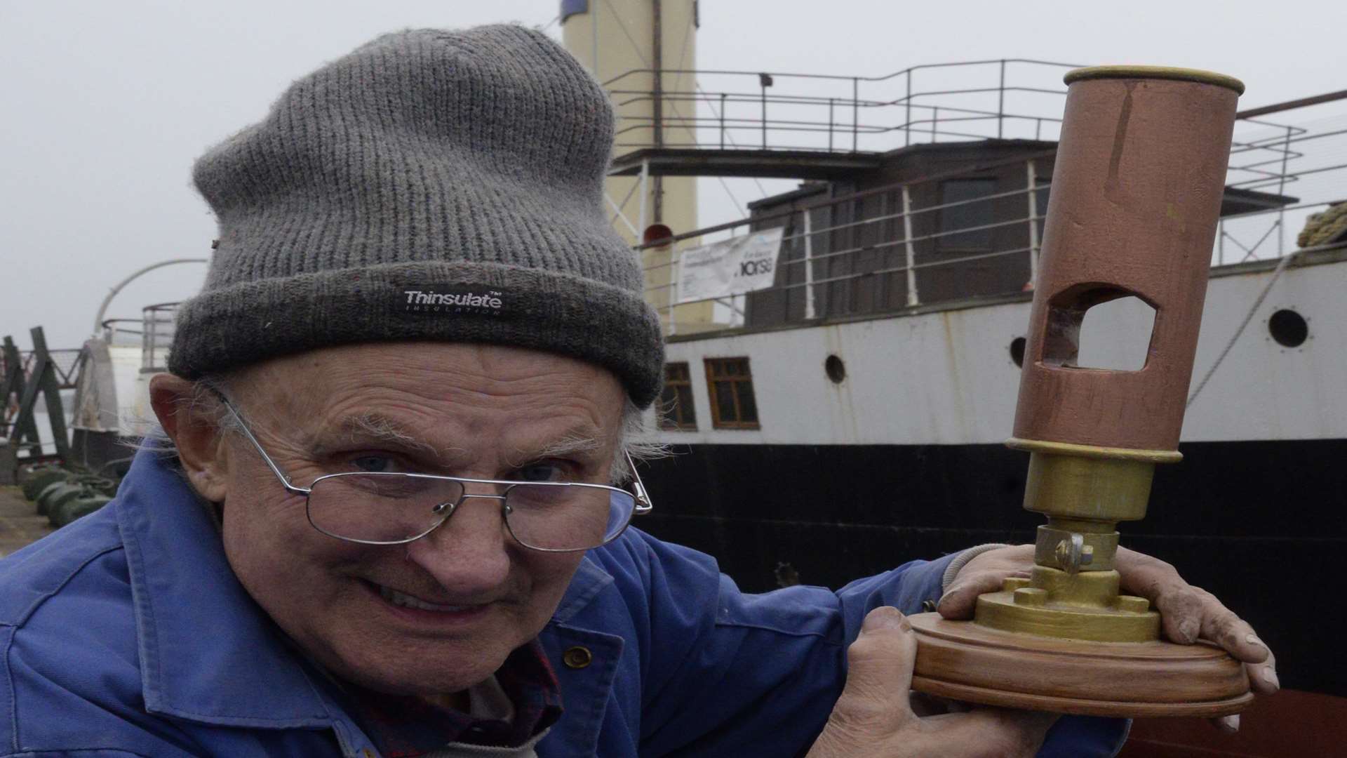 Brian 'Woody' Burgess with the carved ships whistle replica from the Medway Queen