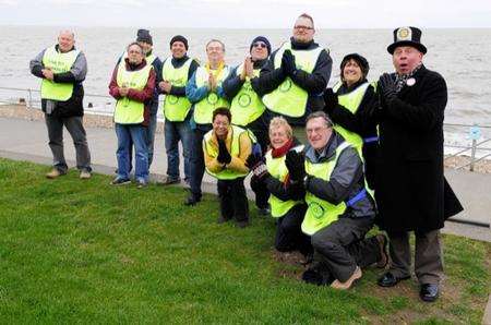 Almost none of the crocus bulbs planted in October's Rotary Club event on The Leas, Minster, have appeared. Here the members of the Rotary Club pray for a miracle.