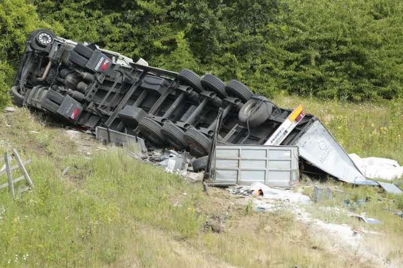 The overturned lorry off the M20