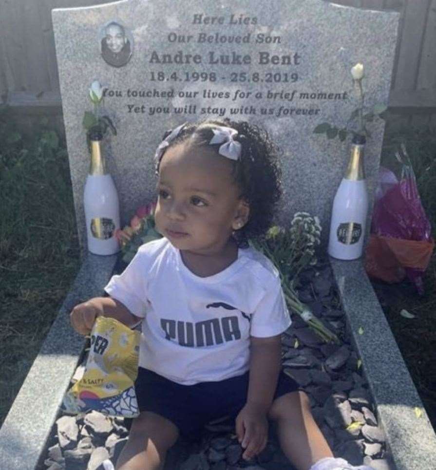 Andre Bent's daughter Neriah, at her dad's grave Pic: Michaela Bent