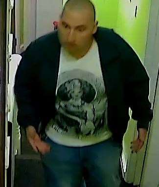 Police have released CCTV of a man in connection with an arson investigation following a fire at a flat in Chatham. Picture: Kent Police (19038561)