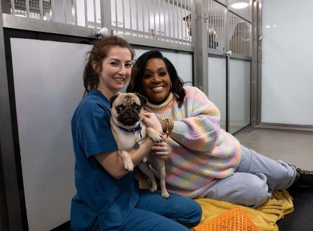 Battersea Pug Stan with Alison Hammond and a member of Battersea's vet team. Picture: Battersea