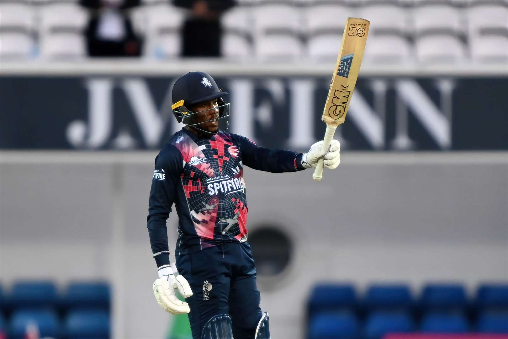Kent captain Daniel Bell-Drummond raises his bat after reaching fifty at Surrey. Picture: Keith Gillard (49060369)