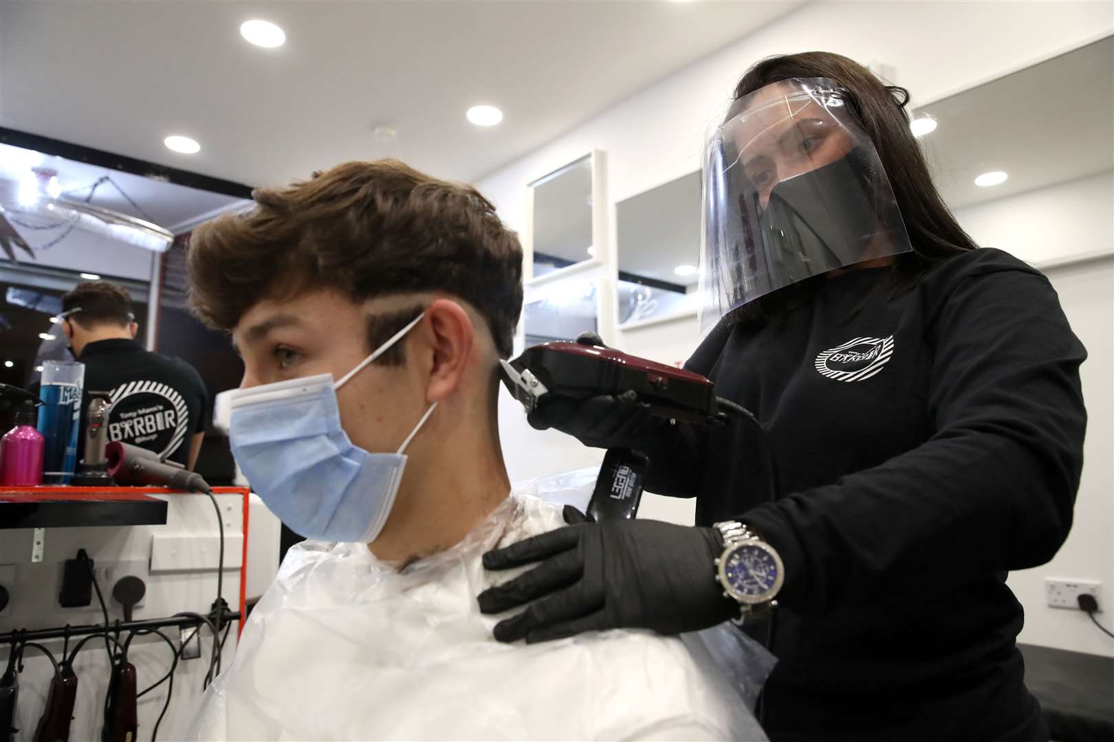 Some restrictions for barbers and beauty salons will be lifted (Andrew Milligan/PA)