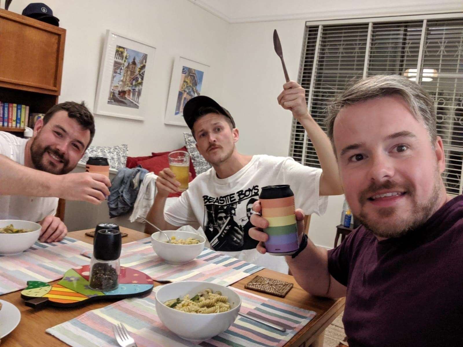 Liam Minnock (far left) and his friends have had to extend their stay at an Air BnB in Sydney