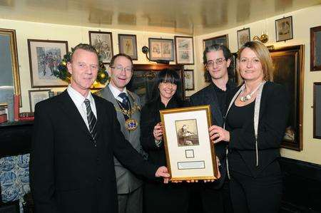 Presentation to Leather Bottle pub in Cobham of a strand of Charles Dickens' hair. L/R, Bryan Treleaven - landlord, Medway Mayor - Vaughan Hewett, Sara Saunders - pub manager, Ian Rons who won the hair, Susan Treleaven - landlady.