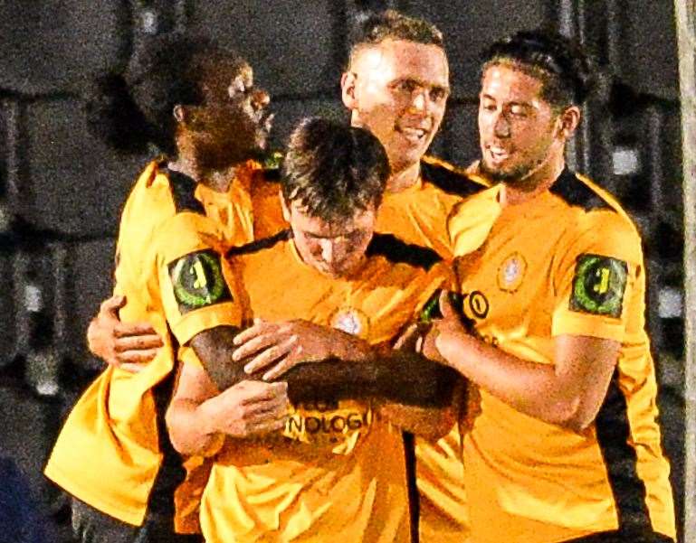 Cray Wanderers' Joe Taylor (second right) celebrates with his team-mates. Picture: Dave Budden (42286980)