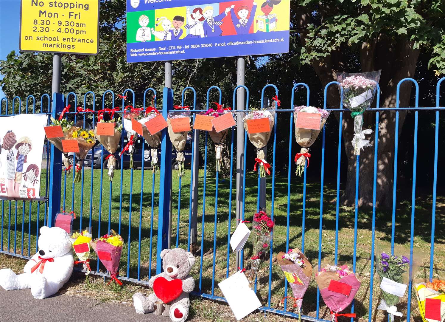 Teddies and flowers at the entrance to Lucas Dobson’s primary school in Deal