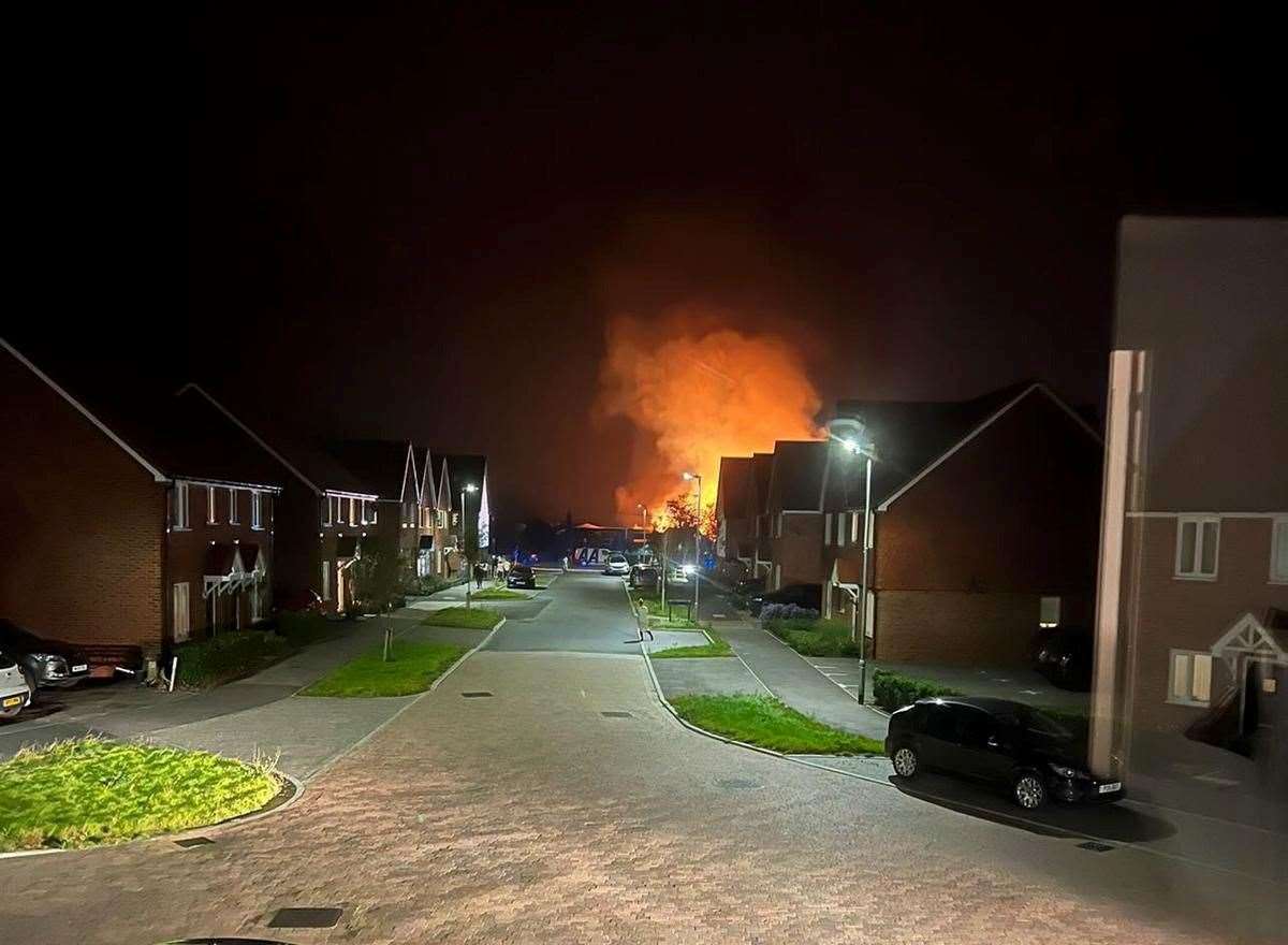 The fire as seen from the nearby Taylor Wimpey estate in Sellindge. Picture: Jon Brisley
